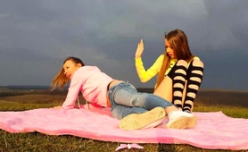two-horny-young-lesbians-masturbate-together-in-the-outdoors