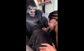 lucky-guy-in-monkey-costume-gets-hot-blowjob-from-sexy-babe