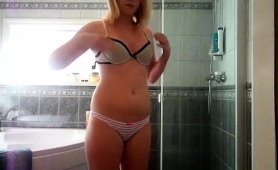 perky-breasted-young-blonde-taking-a-shower-on-hidden-cam